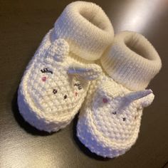 White Knitted Soft Bottom Booties/Socks For Newborn Baby White Winter Booties For Playtime, Winter White Booties For Playtime, Cute Winter Booties For Playtime, Playful White Booties For Playtime, Cute White Winter Booties, White Crochet Casual Booties, Casual White Crochet Booties, Cute Hand Knitted Round Toe Booties, Cute Hand Knitted Winter Booties