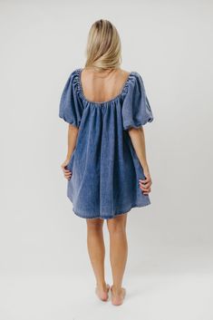 The Morgan Mini Dress is a summer essential -- she's quirky, on-trend, and (thanks to her 100% cotton construction), incredibly comfortable. We love how easy it is to dress this mini up with wedges and accessories, or dress it down with tennies or slides for a day of shopping or sightseeing. You don't want to miss out on this unique addition to your closet! FIT: Runs true to size - relaxed fit. MATERIAL: 100% Cotton. GARMENT DETAILS: Cotton denim mini dress with a swing silhouette and square, el Babydoll Mini Dress, Garment Details, Summer Essential, Denim Mini Dress, Denim Mini, Babydoll Dress, Summer Essentials, To Miss, Baby Dolls