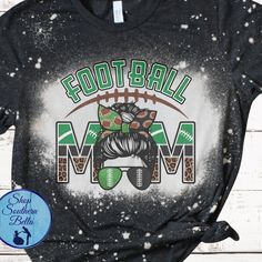 Football Mom Messy Bun Green Black Leopard Unisex Bleached Shirt  Brand: Gildan Softstyle  Color: Dark Heather Available Sizes: Small-4x (4x Available in dark heather only) If you'd like a name on the back of the shirt in black/white vinyl please include under personalization Ships within 5-7 Business Days  Ships USPS First Class with tracking Upon receipt of your order please leave a rating as it helps grow my small business and receive funding for the item purchased. Thank you! Football Mom Shirts Ideas Sons, Mom Messy Bun, Bleach Shirt, Football Stuff, Bleached Shirt, Personalized Football, Shirt Football