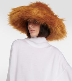 Faux fur hat in orange - Ruslan Baginskiy | Mytheresa Fluffy Faux Fur Hat For Fall, Faux Fur Hat For Fall, Fall Faux Fur Hat With Lining, Fall Hats With Faux Fur Lining, Wide Brim Hat With Faux Fur Lining, Orange Wide Brim Hat For Winter, Orange Wide Brim Winter Hat, Luxury Winter Hat With Faux Fur Lining, Luxury Winter Hats With Faux Fur Lining