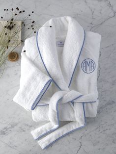 Matouk Robes. Cairo Terry Robe by Matouk. Signature Cairo long-staple cotton terry accented with piping in White or Ivory—to accentuate the tranquil ambience of a truly luxurious bath experience. Add a personal touch to the robe with an elegant monogram. Contact us for more information on Matouk Monogramming.  You'll love Matouk Robes for all-year comfort. Terrycloth bath robe will keep you warm and cozy. Perfect addition to the luxury bath and Matouk bathrobes make a great gift.     100% Long- Custom Robes, Luxury Linens, Terry Robe, 자수 디자인, Towel Collection, Terry Towel, Bias Tape, Fine Linens, Luxury Linen