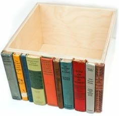 a wooden box filled with lots of books