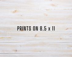 the words prints on 8 5 x 11 are shown in black ink against a white wood background