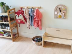 a child's room with wooden toys and shoes