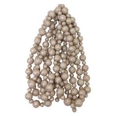 a bunch of silver beads on a white background