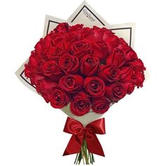 a bouquet of red roses wrapped in paper