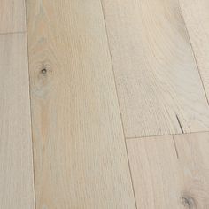 an image of wood flooring that looks like it has been cleaned and is white