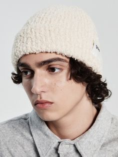 Editor's Notes A casual yet simple Boucle beanie that features an exclusive gac label at the edge. You can style it any way you want.- gac label attached- Boucle beanie- Can style in different ways- Neutral color- Wool mixMeasurements(in.)One Size- Width: 11.02 in. - Height: 10.24 in. Model info: Height - 6' 2 Composition & Care- 50% Acrylic 50% Wool- Machine wash / low dry / low temperature ironDesigner- by GAC Casual Cream Soft Knit Bonnet, Casual Cream Bonnet, White Beanies, Neutral Color, The Edge, Male Model, Neutral Colors, Composition, Mens Accessories