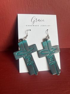 Hand painted embossed 'Jesus' cross earrings.  These earrings are hand painted so each set will vary slightly. Overall and color esthetic will be the same.  The leather is black, premium full grain leather. Features hypoallergenic hardware.  Earring cards are 2.5x3.5 for size reference Custom Glasses, Laser Ideas, Jesus Cross, Cord Organization, Earring Cards, Monogrammed Leather, Cross Earrings, Jesus On The Cross, Leather Cross