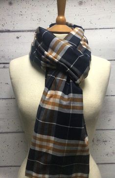 A lovely lightweight scarf in a navy and yellow check design.  Wear with lightweight knits to carry your wardrobe from autumn/winter right through to spring and beyond.  Machine washable  One size Audrey Hepburn Dress, Audrey Dress, Cheque Design, Cotton Gifts, Lightweight Scarf, Tartan Plaid, 1950s Fashion, Dress Backs, Fit & Flare