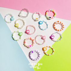 "💜 These cute beaded rings are made with stretchy strings.  🧡 [ Size ]  - They are made with stretchy strings, so keep this in mind when selecting your size. -  Depending on your ring size, the pattern of beads on the ring band can be different from the picture.  🧡 [ Set ] If you choose \"Set of 2 rings\" or \"Set of 3 rings\", please specify your favorite rings and each size of your selected rings in the personalization box.   - e.g. : If you go with \"Set of 3 rings\", then write ring numbe Cheap Cute Beaded Rings, Cute Cheap Beaded Rings, Bead Rings Iron, Bead Rings Straightener, Xoxo Ring Beads, Beaded Rings Patterns, Rings Beaded, Rings Heart, Rings For Couples