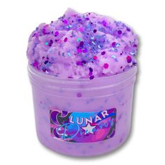 a tub filled with lots of purple sprinkles