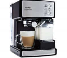 a coffee maker with two cups on it