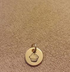 Add a cupcake charm pendant to your necklace! * 3/8"  circle tag  * Choose Brass or Gold Filled * Hand stamped Cupcake Charms, Hand Stamped, Charm Pendant, Gold Filled, Cupcake, Stamp, Stud Earrings, Brass, Etsy Uk