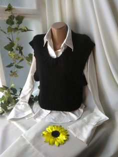 "Black hand-knitted sleeveless pullover for Women. Ladies' crop top tank. Soft merino wool and mohair knit shirt. Sweater Vest. Chest circumference 100cm(40\" inches), length of the cardigan 50cm(20\"). Washing delicately." Fitted Black Sweater Vest, Sweater Vest Office Outfit, Fitted Black Knitted Sweater Vest, Hand Knitted Sleeveless Sweater Vest For Winter, Hand Knitted Sleeveless Sweater Vest, Casual Mohair Knitted Tops, Casual Hand Knitted Knit Vest, Casual Hand Knitted Vest, Fitted Chunky Knit Casual Sweater Vest