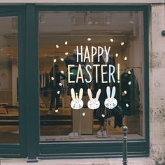 a store window with the words happy easter written on it