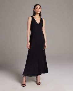 Make an effortless statement with our soft linen maxi dress. The lightweight linen blend makes this the perfect piece for a relaxed warm-weather look. Pair with the Linen Featherlight Blouse or Loose Knit Linen Sweater. 55% Linen, 45% Rayon Made in New York City Chic Unlined V-neck Maxi Dress, Elegant Linen V-neck Maxi Dress, Chic Evening Linen Maxi Dress, Sleek V-neck Bias Cut Maxi Dress, Chic V-neck Unlined Maxi Dress, Classic Summer Evening Maxi Dress, Formal Linen Maxi Dress, Classic Summer Maxi Dress, Sleek V-neck Maxi Dress For Spring