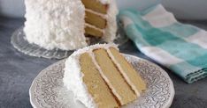 two pieces of cake sitting on plates next to each other