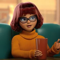 a woman with red hair and glasses holding a cup