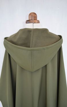 Waterproof and Windproof Cape Coat Green Hooded Cloak | Etsy Solid Hooded Cape For Fall, Green Long Coat For Outdoor Wear, Green Long Coat For Outdoor, Hooded Green Cape For Fall, Green Hooded Cape For Fall, Khaki Hooded Raincoat With Adjustable Hood, Khaki Windproof Raincoat For Fall, Green Winter Cape Outerwear, Khaki Hooded Raincoat For Rainy Weather