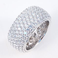 Each carefully selected cubic zirconia are inserted by hand individually by professional jewelers on pure sterling silver 925. The CZ'S in my jewelry are the highest grade in the world. You will not know that it is not a diamond. Once you buy a ZirconZ CZ, you will only want this quality. Gorgeous Color: Black, White, Yellow, Pink Material: Sterling Silver 925 Stone: Cubic Zirconia (CZ) - Signity Stone: Clear CZ Length: 10 mm Height: 3mm THIS RING IS A BIG RING WELL MADE WITH A FILLIGREE BACKING Fantasy Rings, Black Rose Ring, Silver Eternity Ring, Fine Gold Necklace, Luxurious Jewelry, Bling Ring, Eternity Rings, Jewelry Roll, Big Rings