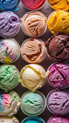 many different colored ice creams in cups