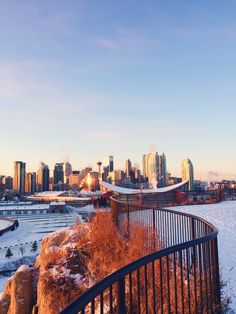 the city skyline is covered in snow and ice