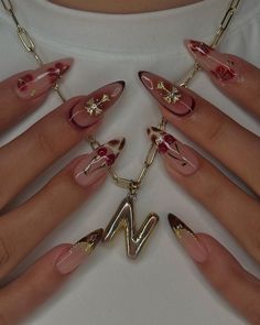 Credits: manisbyash | IG  nails, inspo, inspiration, ideas, trends, nail polish, nail art, fall, christmas, winter, tutorial, aesthetic, french nails, holiday, silver, jewelry, ring, chrome, brown, long nails, almond nails, stiletto, fashion, glow, glow up, self care, sparkles, beauty, nagel design, flowers, ombre, rings, coquette, heart, hearts, glitter, fashion, shiny, cherry red, dark red, wine red, DIY, weinrot, dark, ribbon bows, elegant, rich, chic, thanksgiving, that girl, pinterest app, wish list, weihnachten, herbstnägel, winternägel, outfit, autumn, herbst, visionboard, vision board, holidays, gift, gift ideas, acrylic nails, gel nails, herbstnägel, gelnägel, christmas nails, november nails, thanksgiving nails, winter outfits, winter outfit, blush nails, tortoise shell nails Pinterest Christmas Nails, Christmas Chrome Nails Designs, Red Nails With Jewels, Wine Red Chrome Nails, Christmas Nails Red And Silver, Fall Nails Leopard, Red Nails With Charms, Coquette Christmas Nails, Red Wine Nails Design