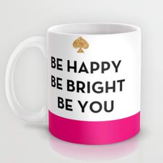 a pink and white coffee mug with the words be happy, be bright, be you