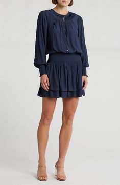 Exude polished style in a flowy long-sleeve dress fashioned with a shirred neckline, billowy sleeves and a smocked blouson waist. 35" length (size Small) Button half placket Crewneck Long sleeves with smocked cuffs 100% polyester Machine wash, line dry Imported Flowy Long Sleeve Dress, Billowy Sleeves, Polished Style, Drop Waist Dress, Ramy Brook, Daytime Dresses, Preppy Look, Dropwaist Dress, Sweaters And Leggings