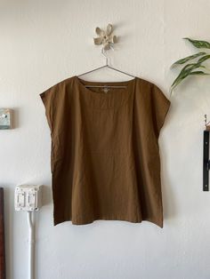 100% cotton tunic by Uzi NYC. Free size. Relaxed Cotton Everyday Blouse, Relaxed Cotton Blouse For Everyday, Casual Brown Cotton Blouse, Relaxed Cotton Blouse For Daywear, Effortless Cotton Blouse For Everyday, Brown Relaxed Fit Cotton Top, Brown Relaxed Fit Crew Neck Blouse, Relaxed Fit Cotton Blouse For Everyday, Cotton Tunic With Relaxed Fit For Daywear