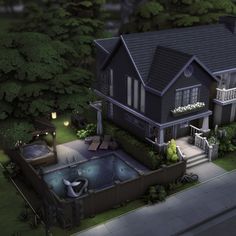 an aerial view of a large house with a hot tub in the yard at night