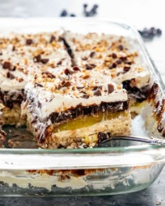 there is a dessert in the glass dish on the table, ready to be eaten