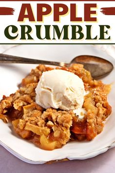 an apple crumble on a white plate with a spoon and ice cream in it