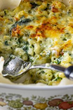 a casserole dish with broccoli and cheese