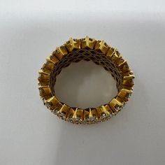 18K Gold Flexible Ring with 85 Full Cut Diamond - 8.0ct (includes appraisal, Value: $15,000) Designer = Jewelry Size = 6 Material = 18K Gold Gemstone = Diamond Condition = Excellent Class = Premier Location: Chicago Item Number: 11405-1330 Item ID: 286697 Category: Ring Luxury Diamond Ring With Vvs Clarity For Party, Gold Diamond Crystal Ring For Party, Designer Gold Ring With Single Cut Diamonds, Luxury Diamond Cut Crystal Ring, Luxury Crystal Ring With Diamond Cut, Luxury Round Crystal Ring With Vvs Clarity, Luxury Gold Diamond Ring With Round Band, Luxury Crystal Gemstone Ring For Party, Luxury Gold Crystal Ring