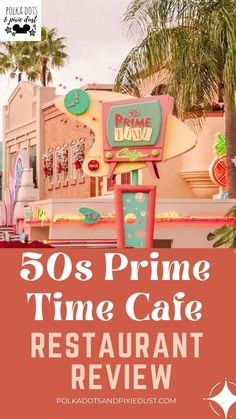 the 50's prime time cafe restaurant review sign with palm trees and buildings in the background