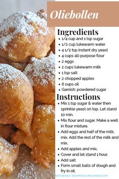 a pile of powdered sugar covered doughnuts