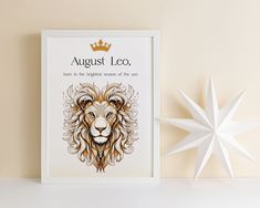 a white star next to a framed poster with a lion's head on it