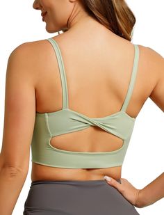 PRICES MAY VARY. Ultra Comfort Soft: ABOCIW Sports bra, made of 75% Nylon+25% Spandex, super soft lightweight fabric which is sweat-wicking, breathable and high elasticity. This kind of sports bra for women with super soft elastic band for comfort movement. Women’s crop tank top for light workout and reduce jiggle. Experience maximum support and comfort with our high impact sports bra designed specifically for women. Our women's sports bras flattering twisted back design and cutout create a stylish and unique look for this scoop neck workout top, perfect for women who want to stand out in the gym. Matching: Choose from a variety of colors, including white, to match your style. Our sports bra featured with wireless support and backless design, can shows your curved perfect match with yoga p Breathable Scoop Neck Sports Bra For Workout, Green Sleeveless Sports Bra For Light Sports, Green Stretch Scoop Neck Sports Bra, Green Seamless Sports Bra For Workout, Green Seamless Tank Top For Gym, Green Seamless Gym Tank Top, Green Scoop Neck Stretch Sports Bra, Green Bra Friendly Tank Top For Workout, Green Sports Tank Top With Built-in Bra