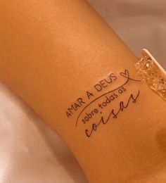 a woman's arm with writing on it