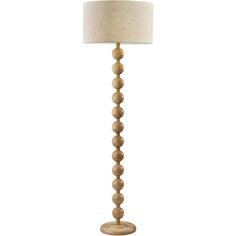 a wooden floor lamp with a white shade on it's base and a beige linen lampshade