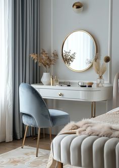 a bedroom with a bed, desk and mirror