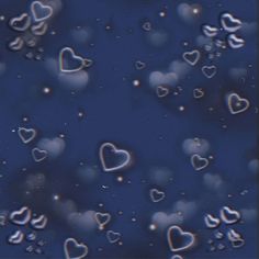 hearts are floating in the air on a dark blue background with bubbles and water droplets