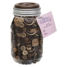 a jar filled with lots of different buttons