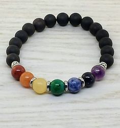 Make Beaded Bracelets, 7 Chakra Stones, Chakra Beads Bracelet, قلادات متدلية, Homemade Bracelets, Crystal Bead Jewelry, Lava Bead Bracelet, Diy Bracelet Designs, Beads Bracelet Design