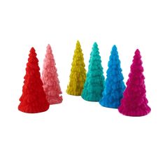 small plastic christmas trees in different colors