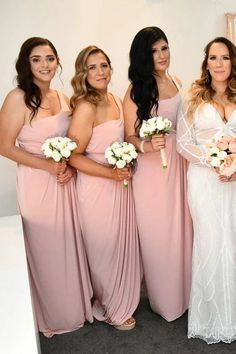 the bridesmaids are all wearing pink dresses