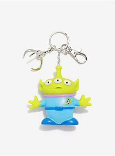 a keychain with a cartoon character wearing a crown on it's head