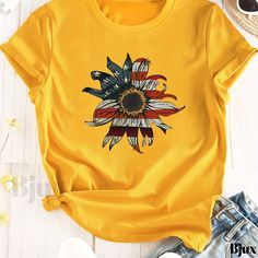 Bjux - Womens Plus Size Patriotic T-Shirt with Floral Print and Flag Pattern, Short Sleeves, Round Neckline and Slight Stretch for Casual Comfort on Independence Day Multicolor Flag Print Casual T-shirt, American Flag Print Crew Neck Top For Spring, Yellow Summer Top With Sublimation Print, Summer Flag Print Short Sleeve Tops, Yellow Sublimation Print Top For Summer, Multicolor American Flag Print Short Sleeve T-shirt, American Flag Print Short Sleeve Top For Spring, Multicolor Crew Neck T-shirt With American Flag Print, Summer Sunflower Print Crew Neck Top